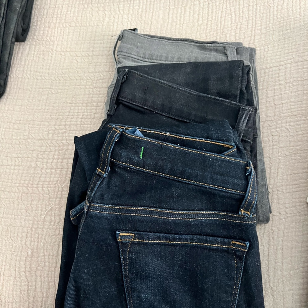 3 pairs of J Brand Jeans, sold all together, 2 dark blue and 1 grey. Skinny